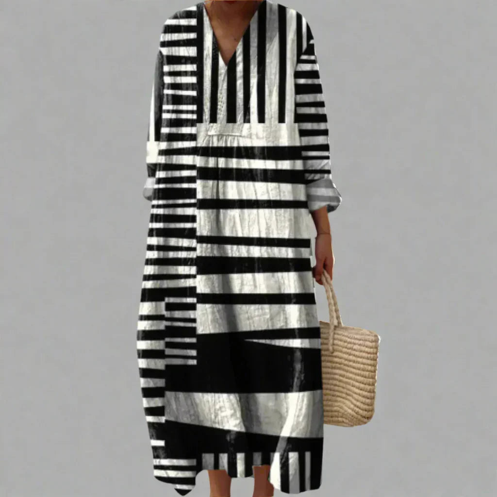 Geometric striped midi dress with V-neck, black and white blocks, long sleeves