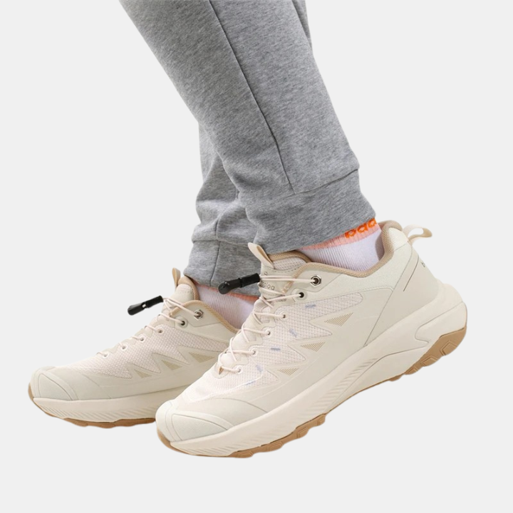 White breathable mesh elastic buckle sneakers with lace-up front and chunky rubber sole