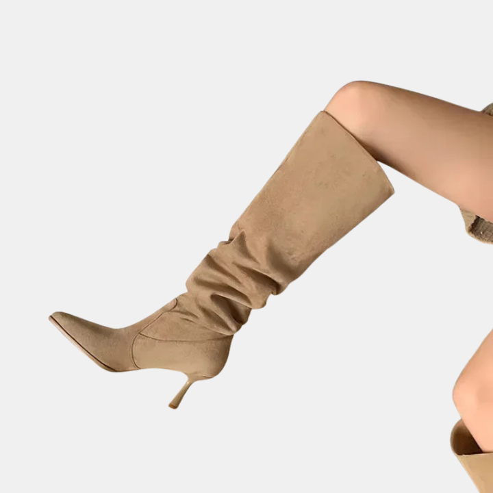 Khaki pointed-toe heeled cowboy boots, side view, tall slouchy shaft, slim heel