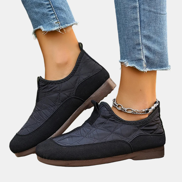 Dannah non slip boots, black quilted slip-on with brown outsole and chain cuff