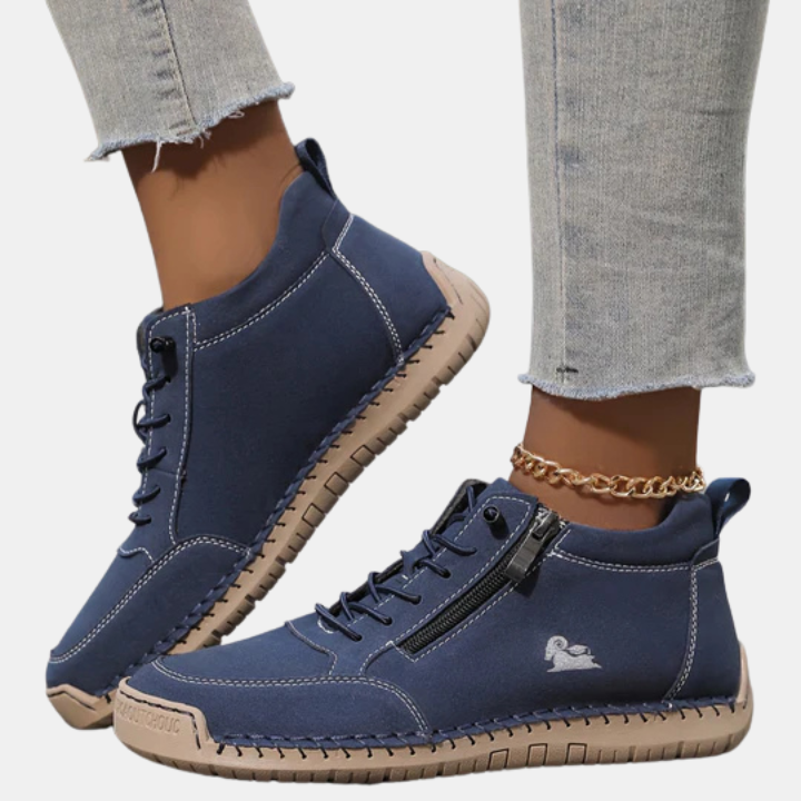 Navy orthopedic lace-up shoes with side zipper, chain ankle detail, and cushioned sole