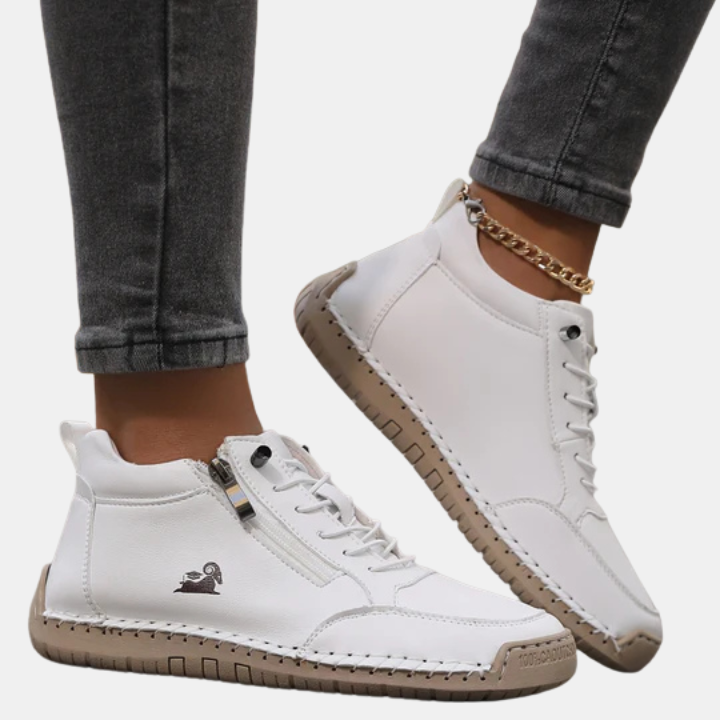 White orthopedic lace-up shoes with side zipper and thick tread sole