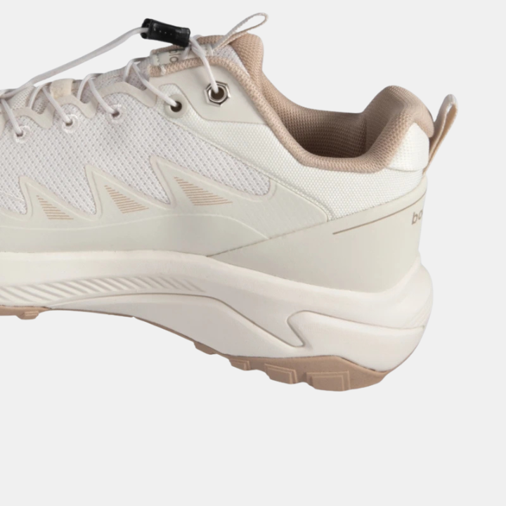 White sneaker heel with elastic buckle strap and sidewall cushioning detail