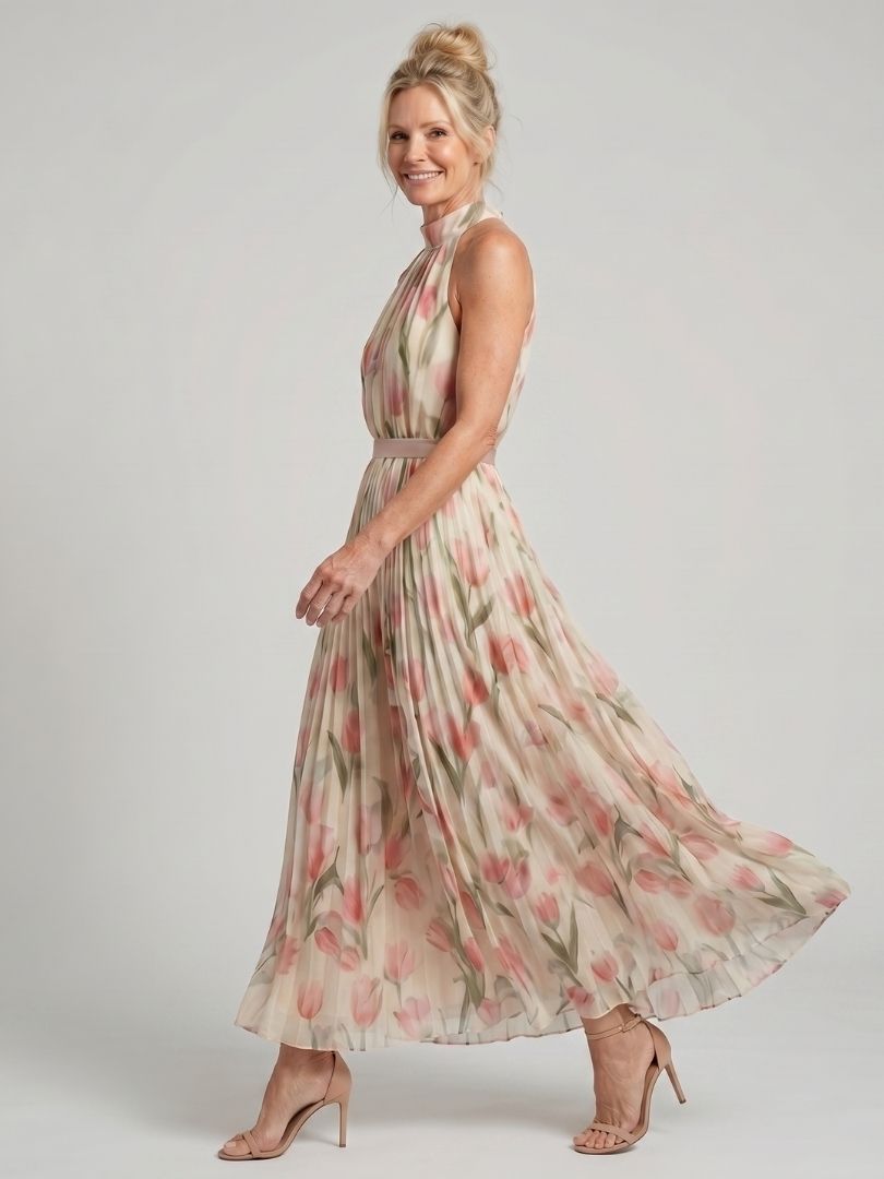 Halter neck floral midi dress with sleeveless halter, tie belt, and flared hem
