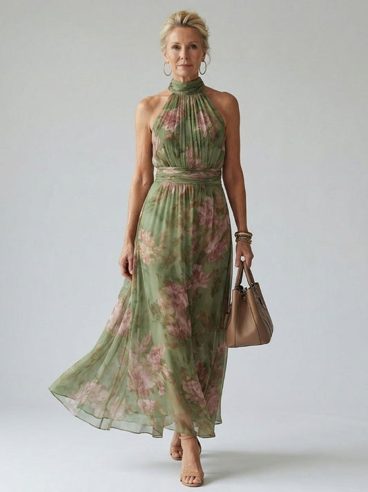 Sage green gathered halter midi dress with pink floral print, high neck and cinched waist