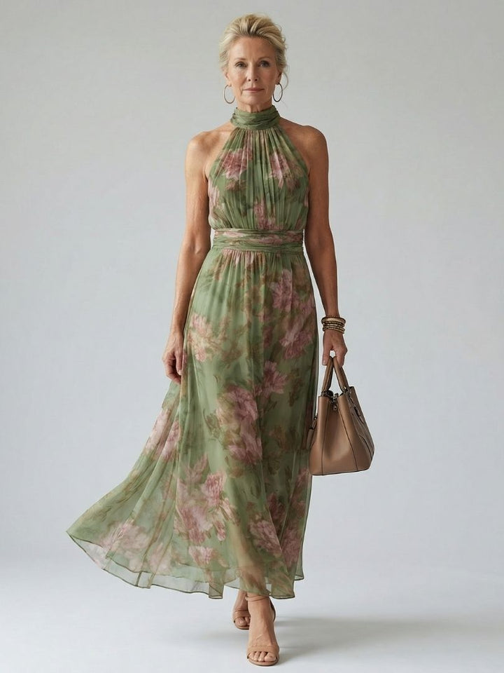 Sage green gathered halter midi dress with pink floral print, high neck and cinched waist