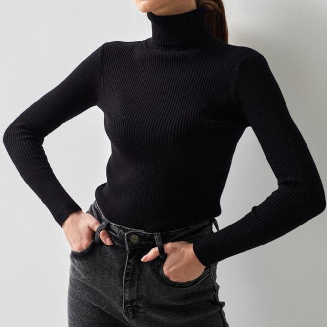 Black ribbed turtleneck sweater with long sleeves and a fitted, high collar