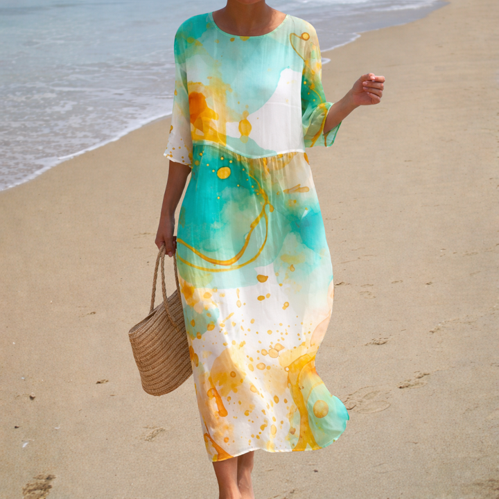 Long flowing dress, 3/4 sleeves, crew neck; aqua/white with yellow-orange abstract print