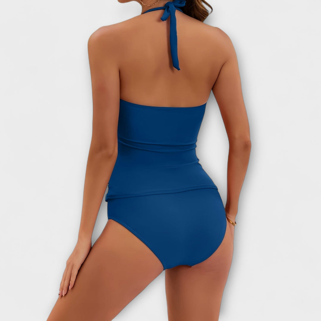 Blue halter back two-piece swimsuit with gathered waist and high-rise bikini bottoms