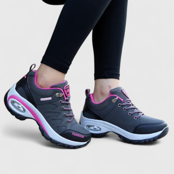 Novira women’s sport shoes, dark gray pair with pink laces and white cushioned sole