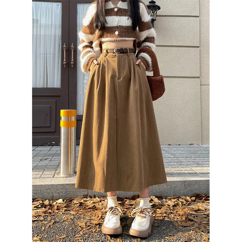 Tan corduroy midi skirt with wide belt and pleated waistband