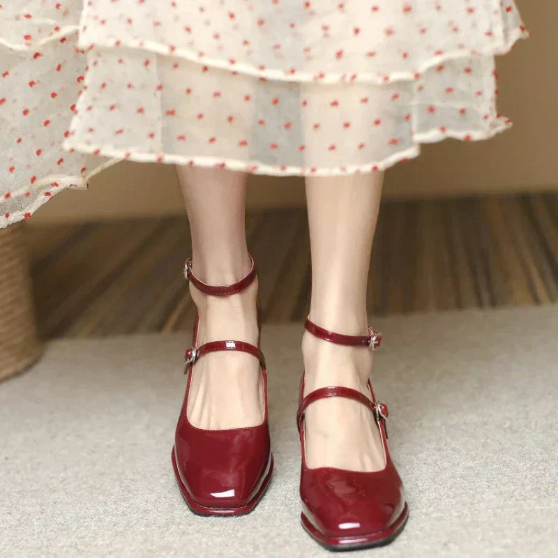 Wine red ankle-strap pumps with thin straps and low block heels