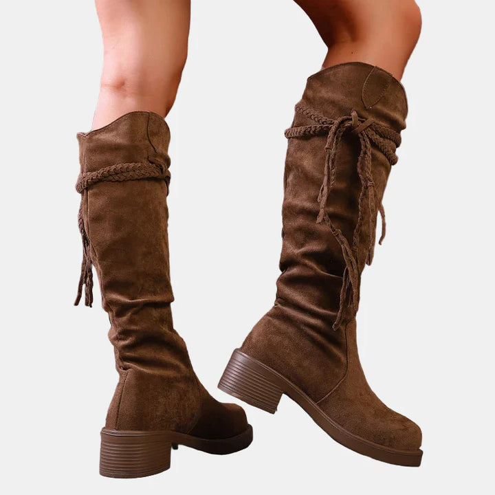 Brown suede mid-calf ankle boots with chunky heel and knotted lace tassels