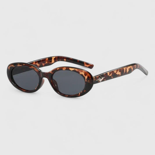 Danyqee stylish sunglasses with leopard brown frames and dark lenses, oval shape