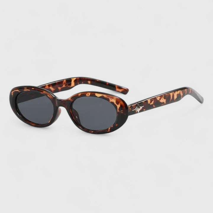 Danyqee stylish sunglasses with leopard brown frames and dark lenses, oval shape