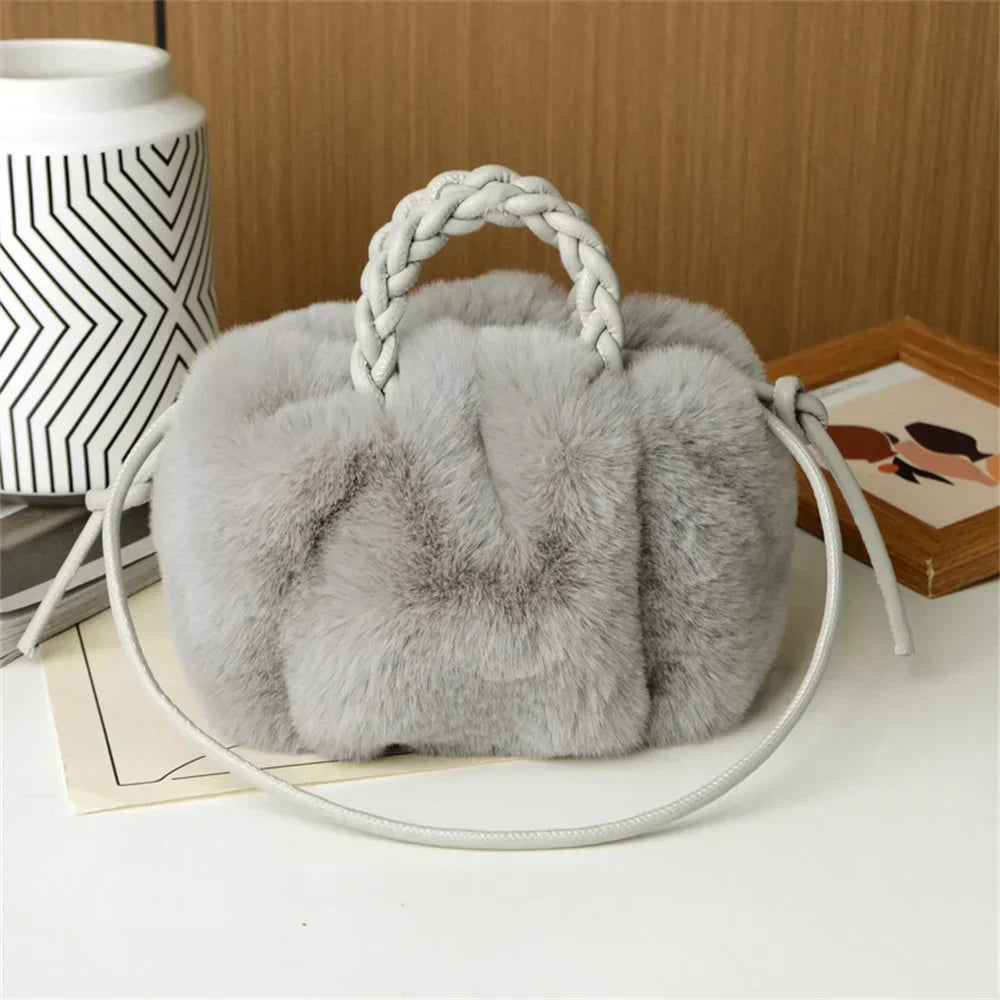 Grey plush pumpkin shoulder tote with braided handle and long rope strap