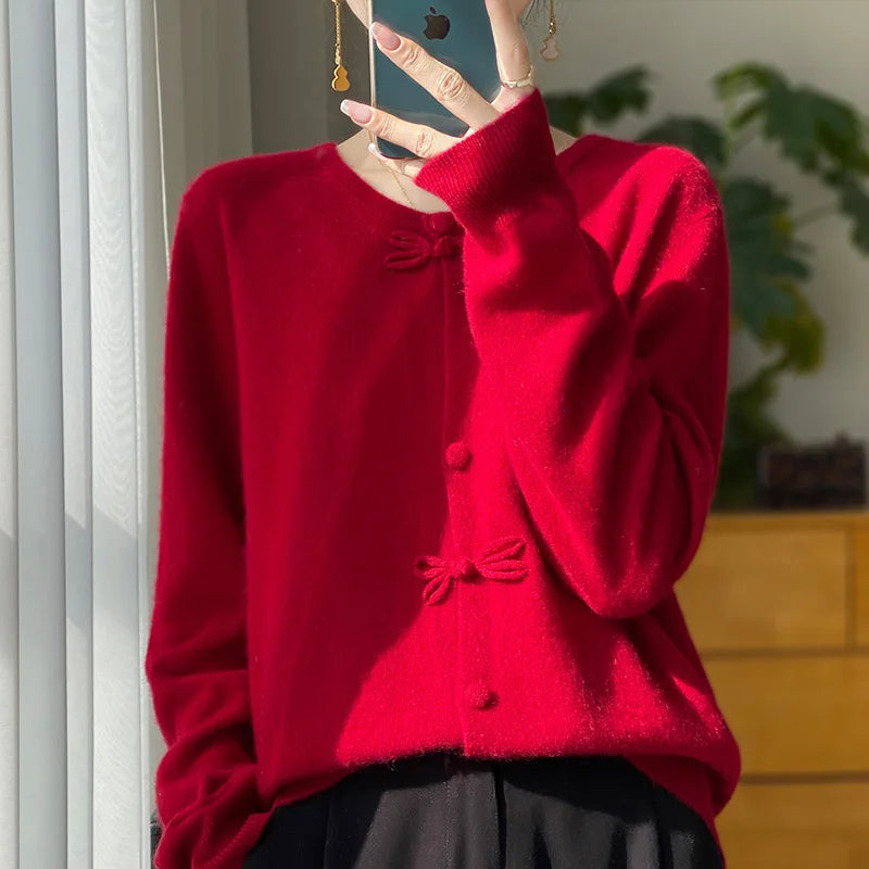 Red bow-front cardigan with button placket and bow details