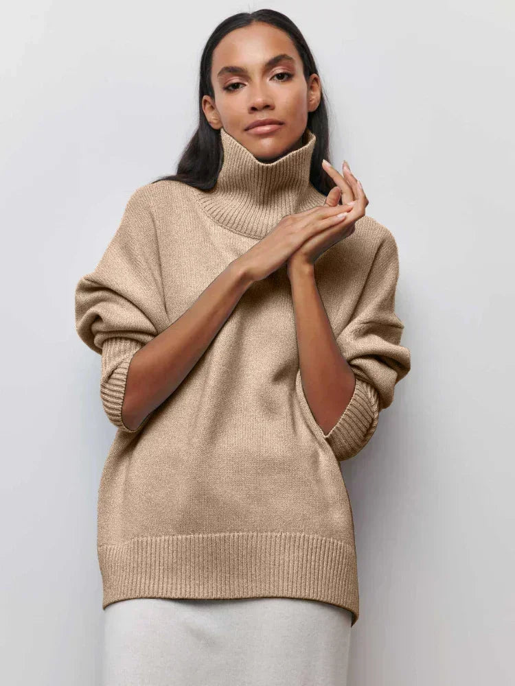 Camel beige turtleneck sweater with long sleeves and ribbed collar and hem