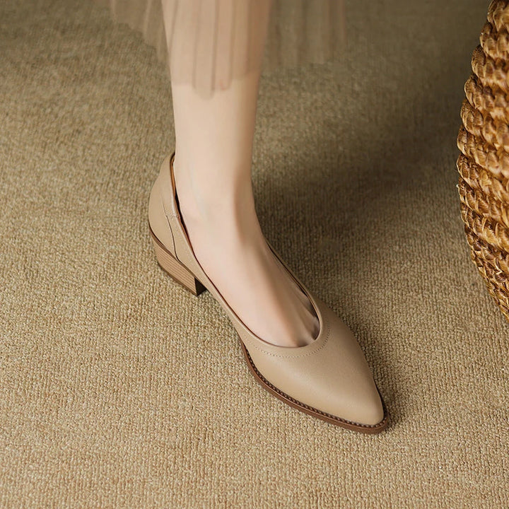 Apricot mid heeled shoes with pointed toe and low stacked heel, side profile view