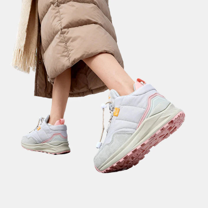 Waterproof plush sneakers, light gray with pink accents, lace-up with padded collar.