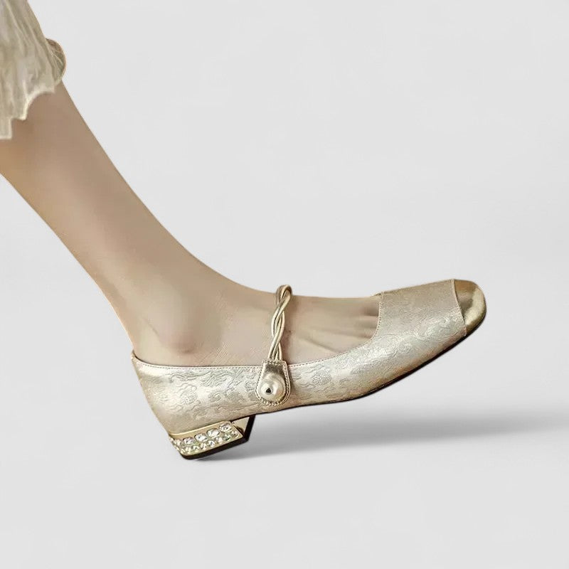 Gold Mary Jane orthopedic shoes with buckle strap and textured low heel
