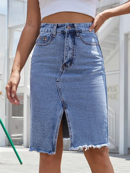 Denim midi skirt with front slit, button fly, and frayed hem in medium blue