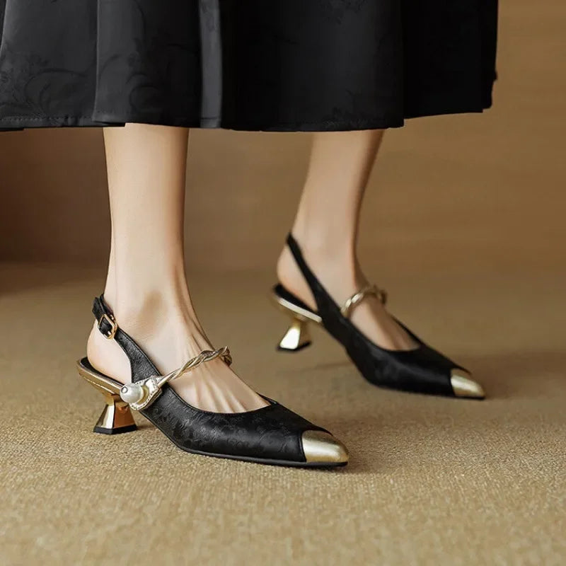Molette elegant pumps in black, pointed toe slingback with pearl charm and block heel