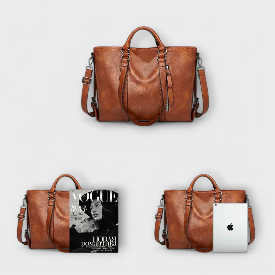 Brown leather large bag with top handles and crossbody straps.