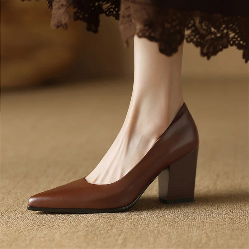 Brown leather pumps with almond toe and medium block heel