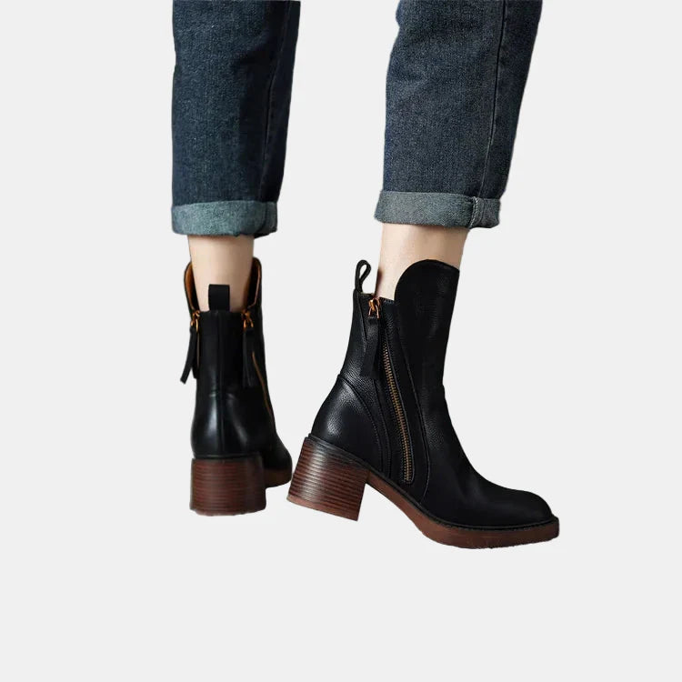 Black platform ankle boots with side zipper and chunky brown heel