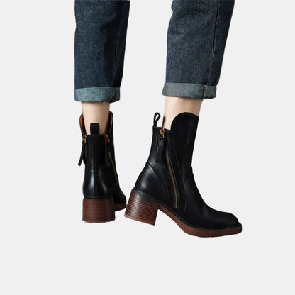 Black platform ankle boots with side zipper and chunky brown heel