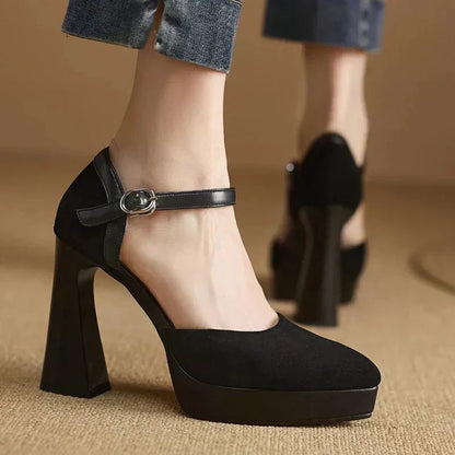 Black suede pumps with ankle strap and silver buckle, chunky block heel