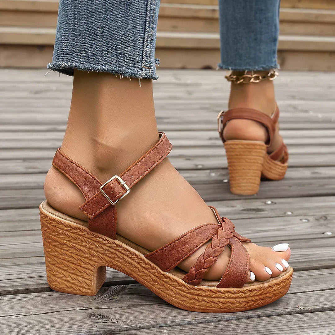 Comfortable sandals in tan-brown with braided knot toe, ankle buckle, and chunky platform heel