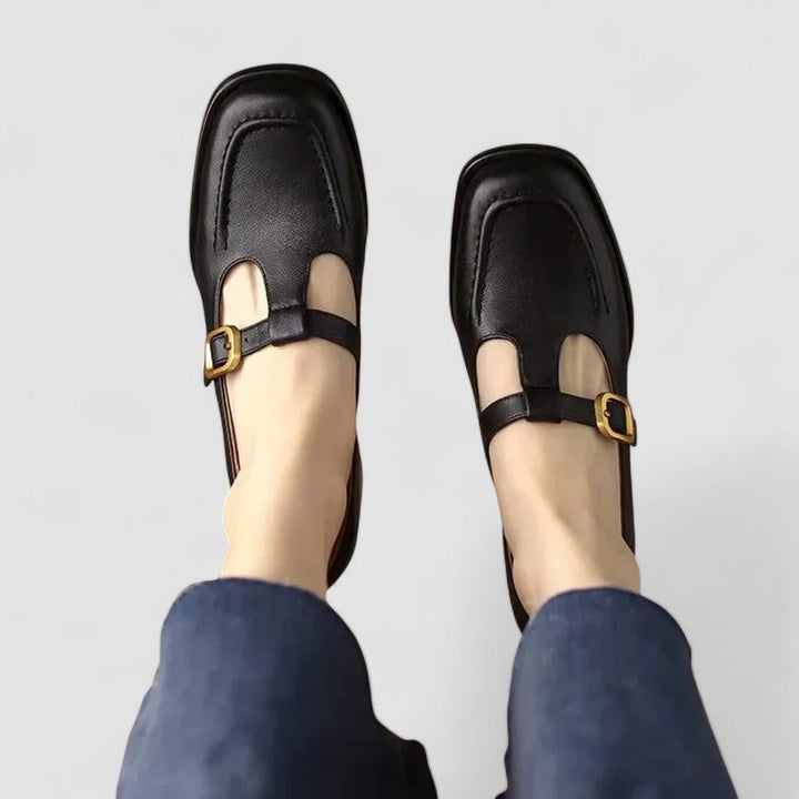 Black T-strap Mary Jane shoes with buckle, low block heel, open instep