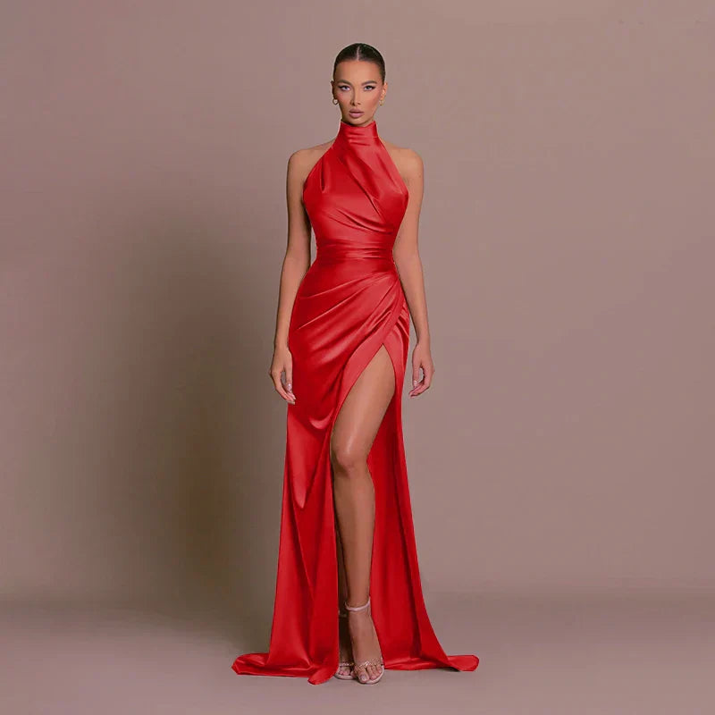 Red satin side-slit maxi dress, halter neck, sleeveless with draped wrap front.