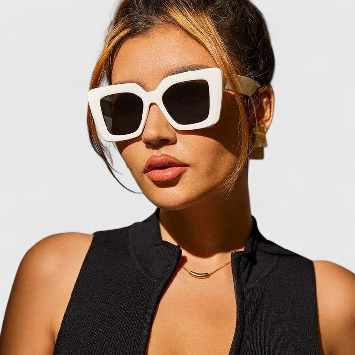 White square sunglasses with dark lenses and thick frame