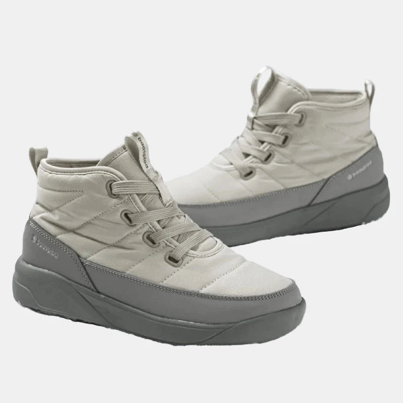 Cream non-slip ankle boots, lace-up design with side quilting and thick gray sole