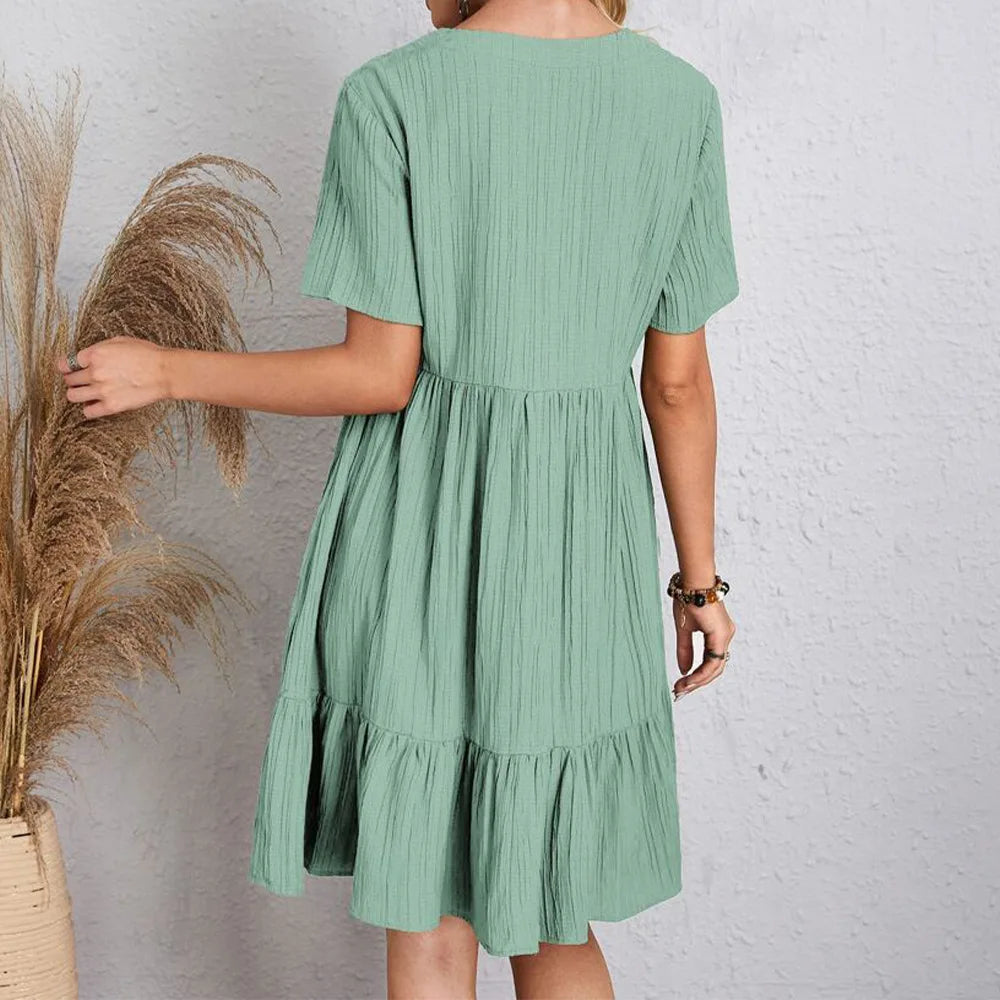 Light green V-neck casual summer dress, short sleeves, tiered back view