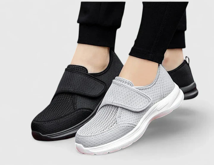 Orthopedic Velcro slip-on shoes: white-gray front and black pair in back
