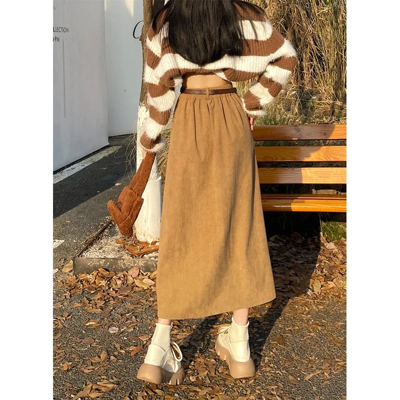 Khaki corduroy midi skirt with buttoned waistband and wide belt
