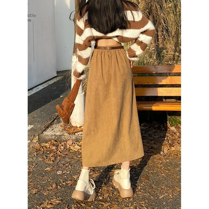Khaki corduroy midi skirt with buttoned waistband and wide belt