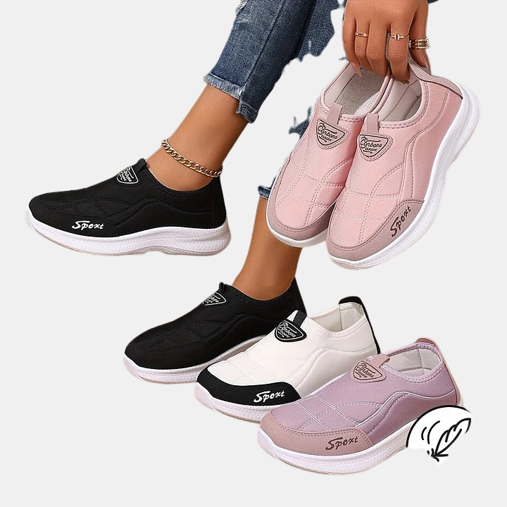 Talia non-slip sneakers in black and pink with white soles, side-by-side view