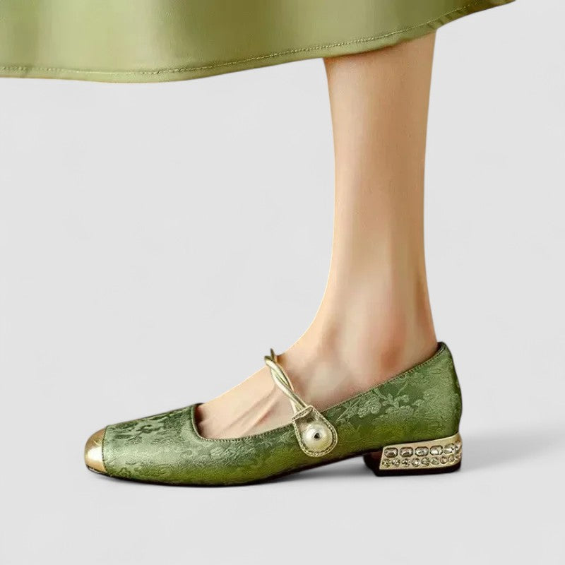 Green orthopedic Mary Jane flats with round toe, gold bow strap, jeweled heel