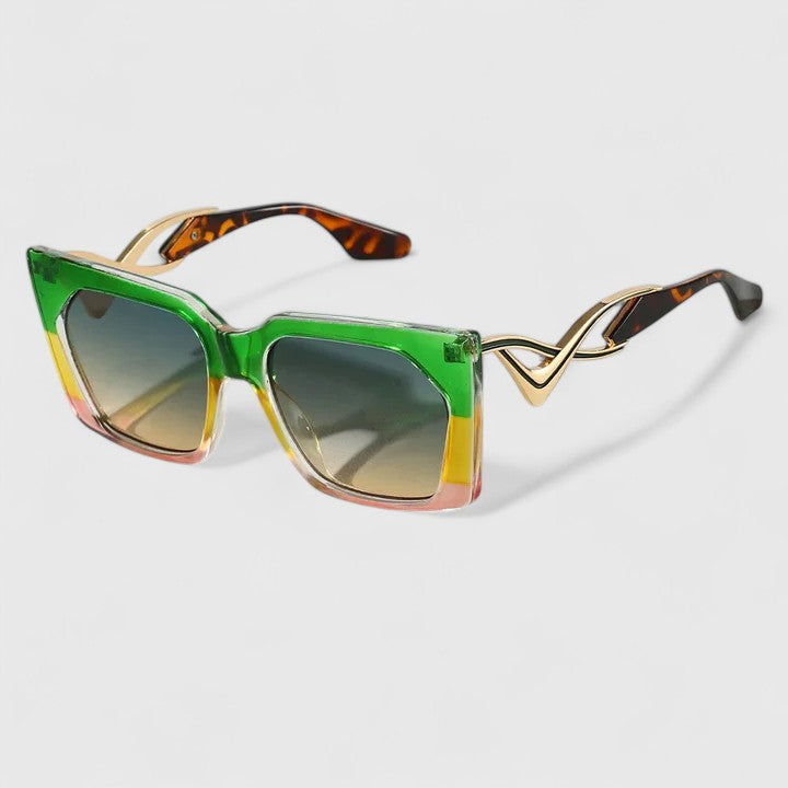 Cat-eye sunglasses with green frame, yellow accents, and blue tinted lenses