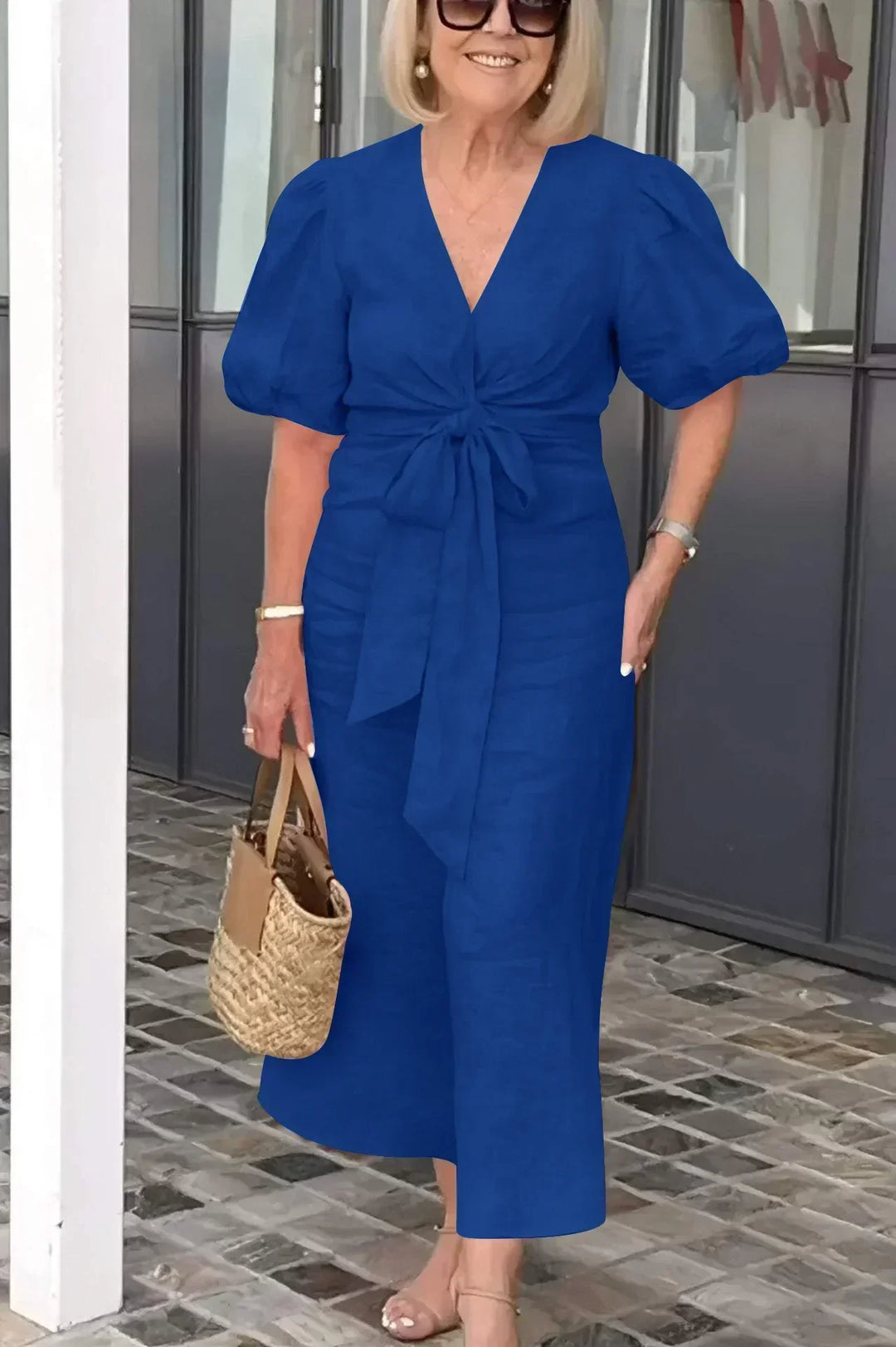 Blue V-neck midi dress with puff sleeves and waist tie, front view