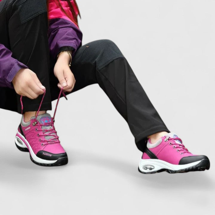Novira women’s sport shoes, pink lace-up pair with chunky white midsole