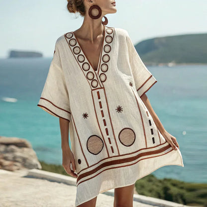 Cream linen beach dress with V-neck, short sleeves, circular border embroidery