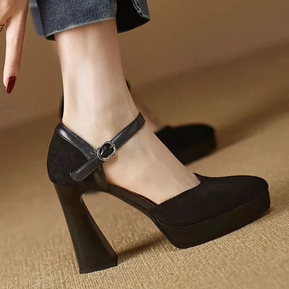 Black suede pumps with ankle strap and round buckle, chunky block heel