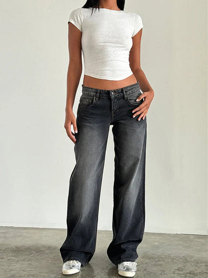 Dark gray vintage baggy jeans with high waist, belt loops, button fly, and relaxed wide legs.