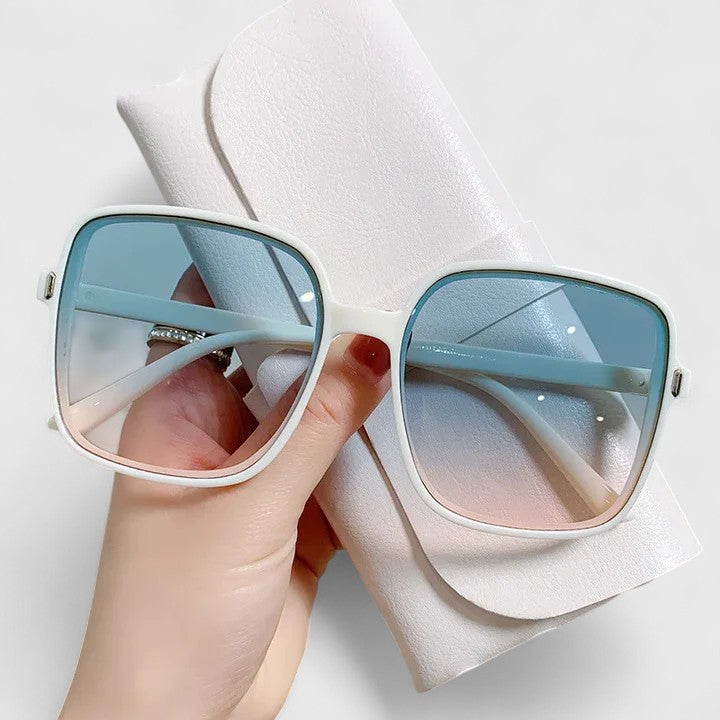 White square sunglasses with light blue tinted lenses and metal hinges